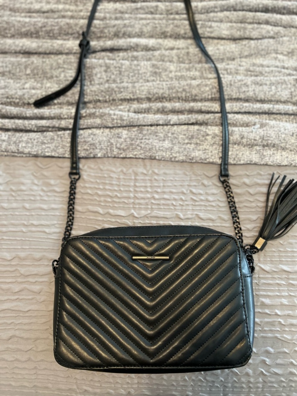 Aldo Black Chevron Quilted Crossbody Bag with Tassel Accent